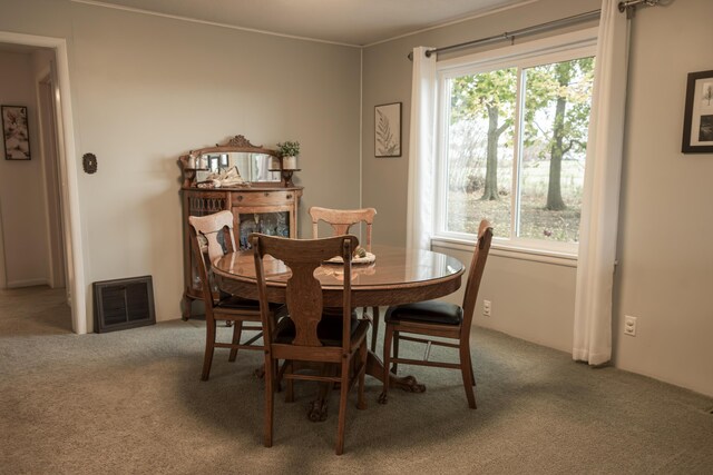 317 Maiden Ln, Saint Joseph, MI 49085 - dining room featuring carpet and plenty of natural light