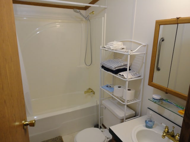 full bathroom featuring sink, shower / bathtub combination, and toilet