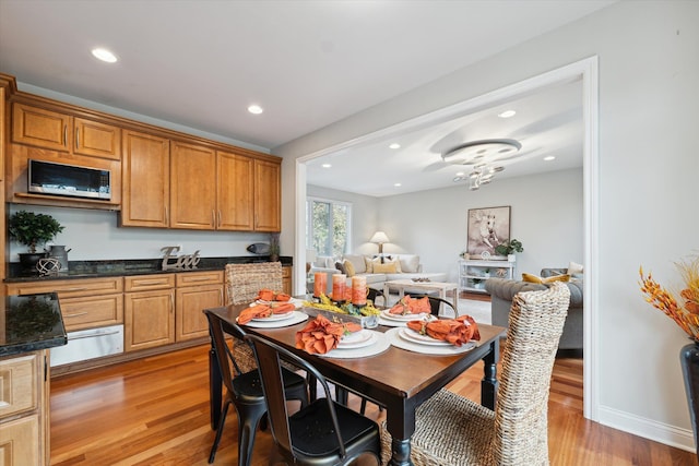 dining room with light hardwood / wood-style flooring