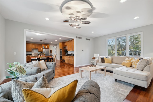 living room featuring dark hardwood / wood-style floors