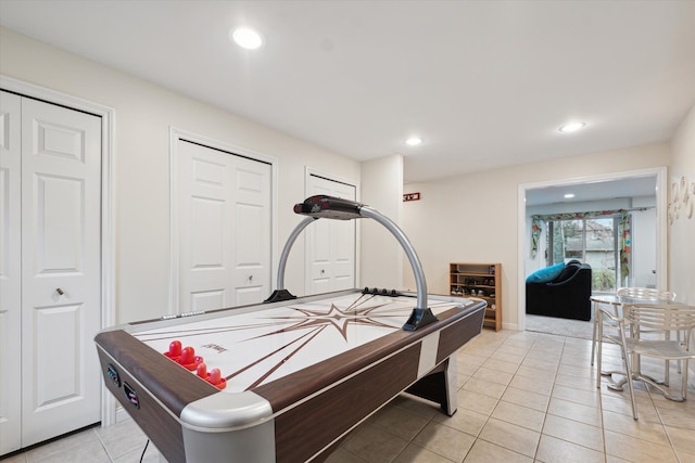 playroom with light tile patterned floors