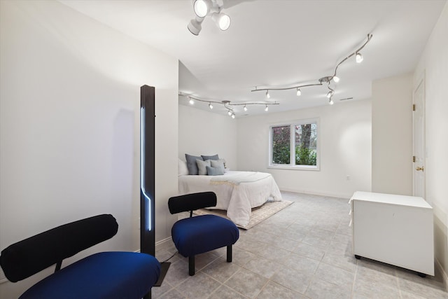 tiled bedroom featuring fridge