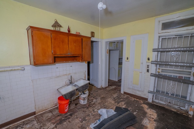 kitchen with tile walls