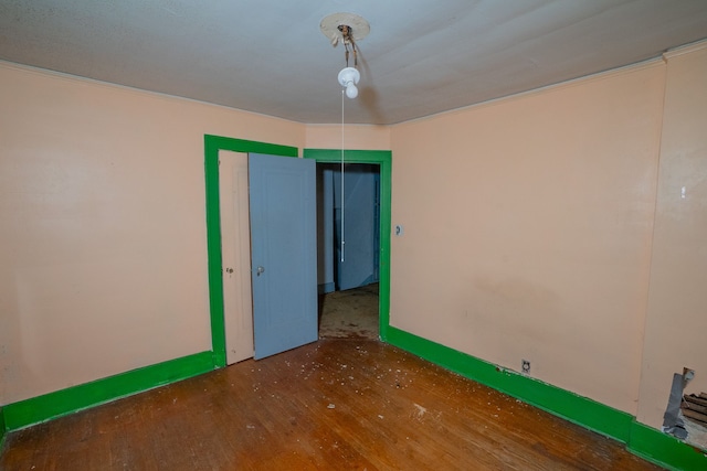 unfurnished room featuring dark hardwood / wood-style floors