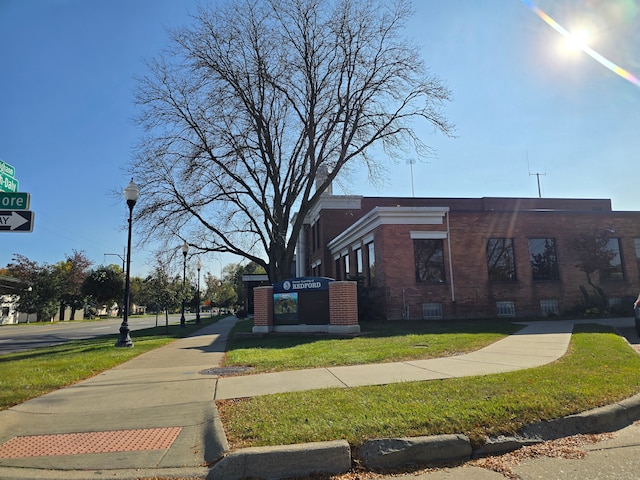 view of home's exterior featuring a lawn