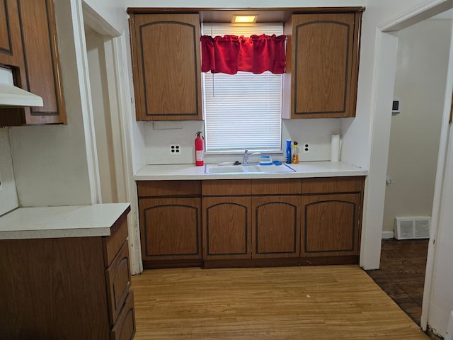 kitchen featuring sink and light hardwood / wood-style floors