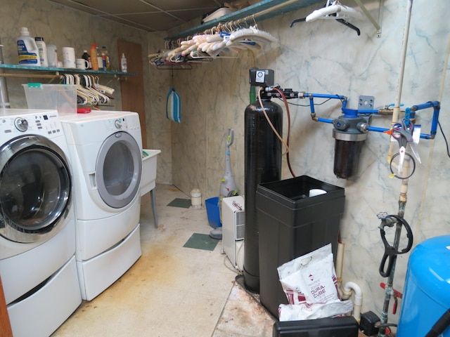 washroom with washing machine and dryer