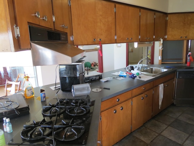 kitchen featuring dishwashing machine, black gas stovetop, and sink