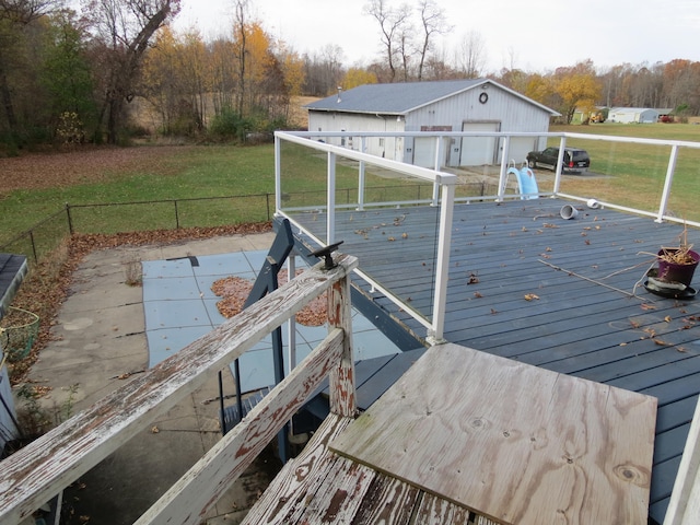 exterior space with a deck and a yard