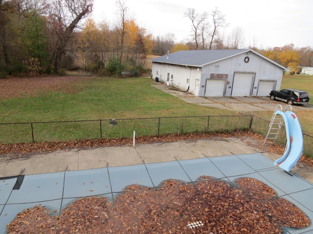 view of yard featuring a garage