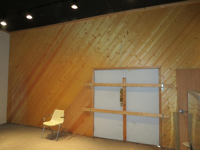 interior space featuring wood walls