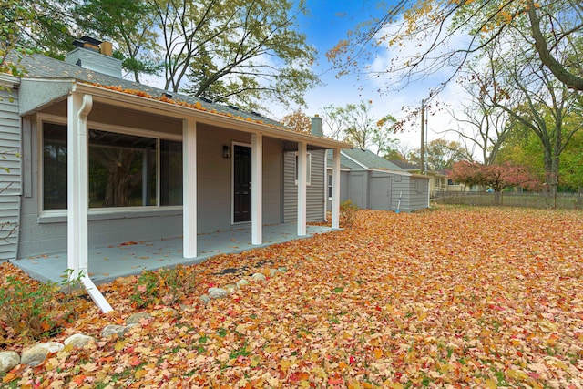 back of house with a patio area