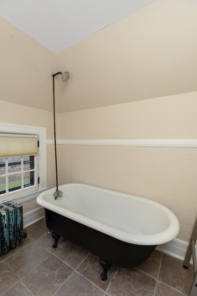 bathroom featuring a tub to relax in