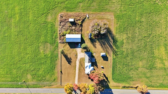 birds eye view of property featuring a rural view