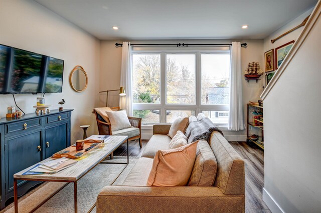 208 Gillis St, Traverse City, MI 49684 - living area with plenty of natural light, wood finished floors, recessed lighting, and baseboards