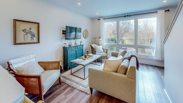 208 Gillis St, Traverse City, MI 49684 - living area featuring wood finished floors and recessed lighting