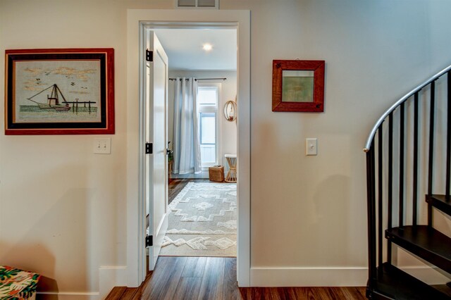 208 Gillis St, Traverse City, MI 49684 - hallway with dark wood-style flooring and baseboards