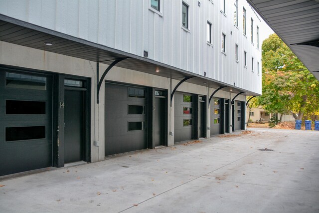 208 Gillis St, Traverse City, MI 49684 - view of building exterior with a garage