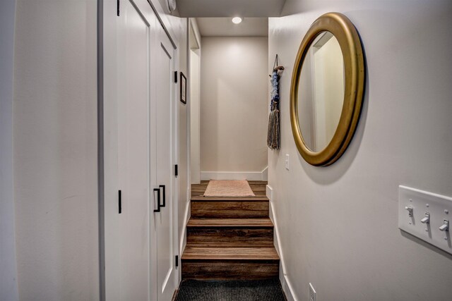 208 Gillis St, Traverse City, MI 49684 - stairway with baseboards, recessed lighting, and carpet flooring