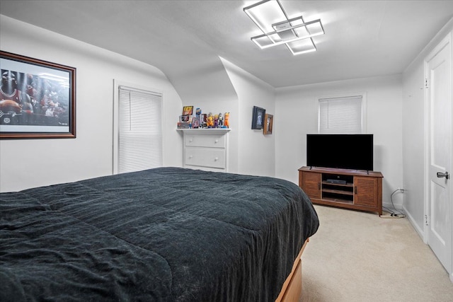 bedroom with light colored carpet