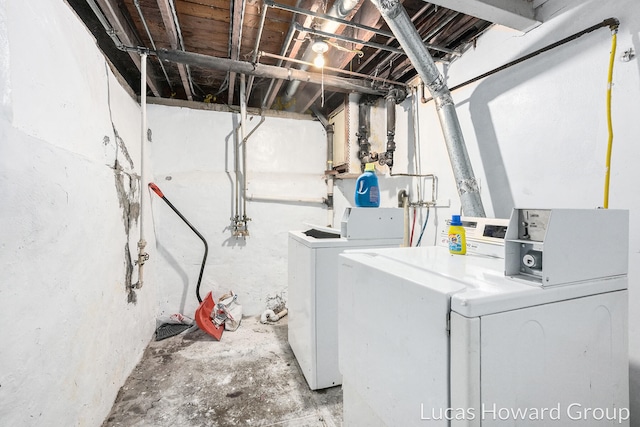 laundry area with independent washer and dryer