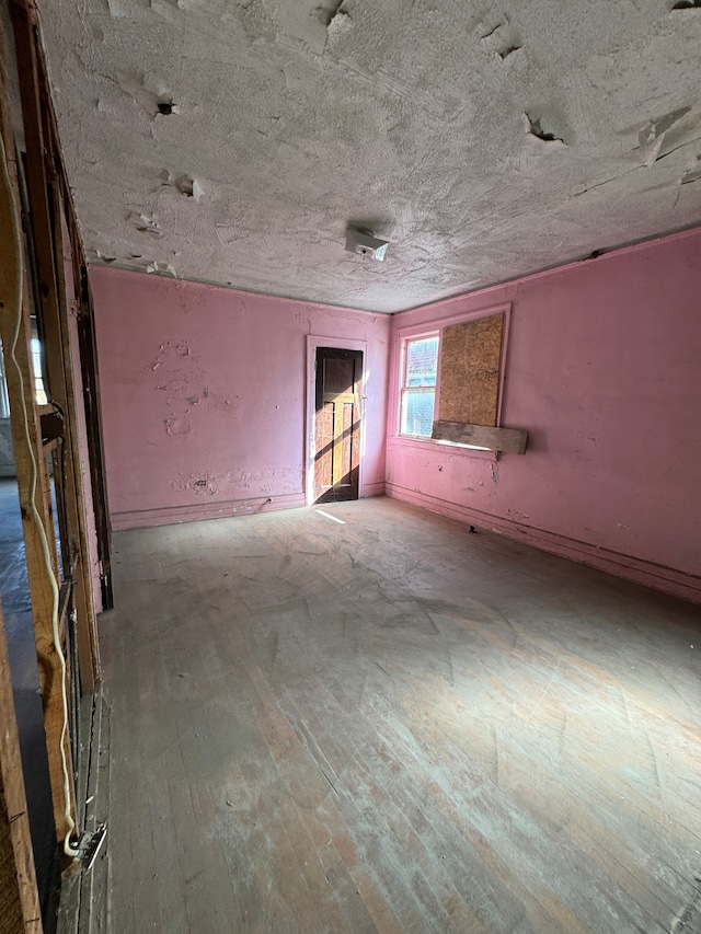 empty room with light hardwood / wood-style floors