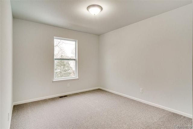 view of carpeted spare room