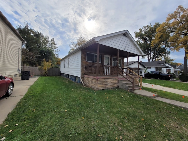 bungalow-style house featuring a front lawn and a porch