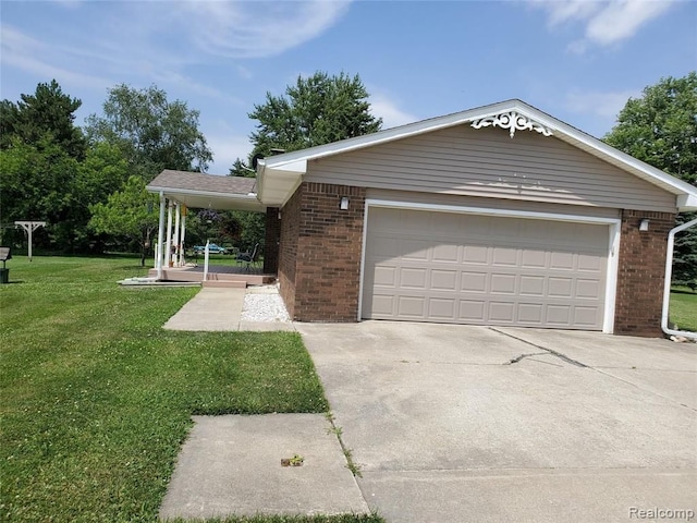 garage featuring a yard