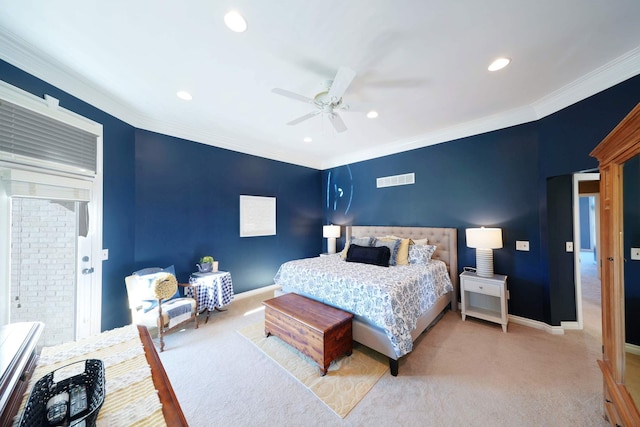 carpeted bedroom with ceiling fan and ornamental molding