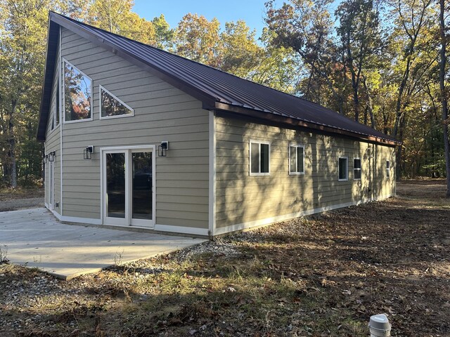 1820 S Reid Rd, Custer, MI 49405 - view of side of property with metal roof