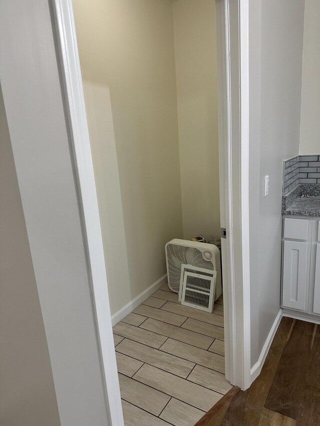1820 S Reid Rd, Custer, MI 49405 - bathroom with wood finished floors, vanity, and baseboards