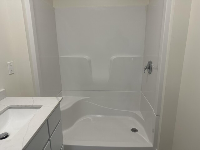 1820 S Reid Rd, Custer, MI 49405 - bathroom with a shower and vanity