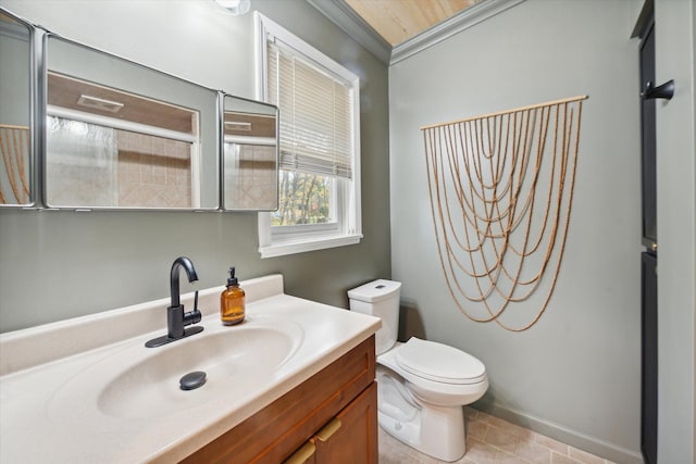 bathroom featuring vanity, tile patterned floors, toilet, ornamental molding, and an enclosed shower