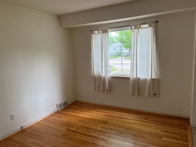 empty room featuring light hardwood / wood-style flooring