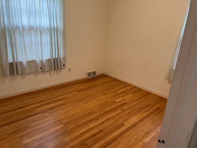 empty room featuring light hardwood / wood-style floors