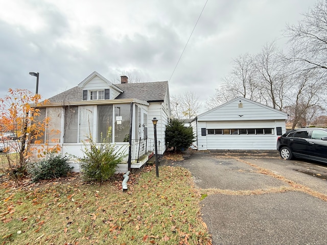 bungalow featuring a sunroom