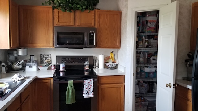 kitchen featuring black electric range