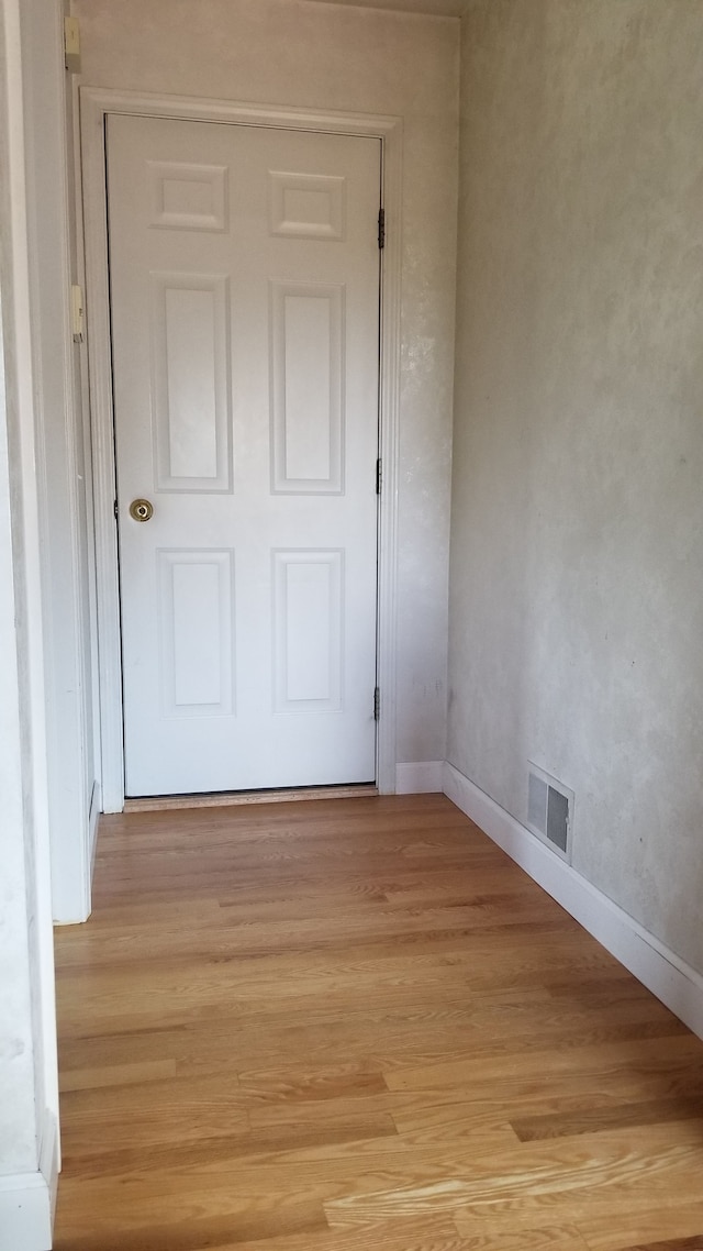 doorway to outside featuring light wood-type flooring