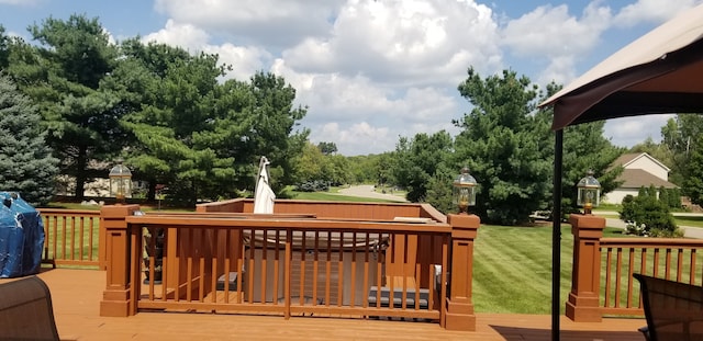 wooden deck featuring a gazebo