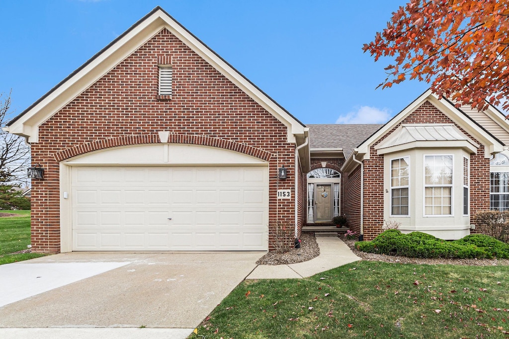 view of front of property with a garage