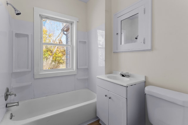 full bathroom featuring vanity, toilet, and  shower combination