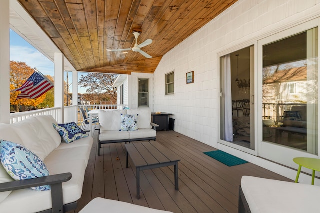 wooden terrace featuring an outdoor hangout area and ceiling fan