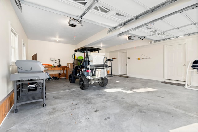 garage featuring a garage door opener