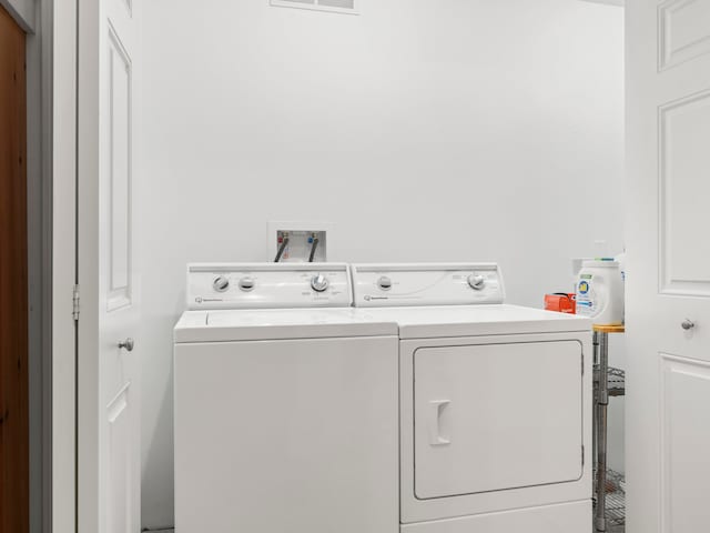 laundry area featuring washer and clothes dryer