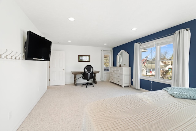 bedroom featuring light colored carpet