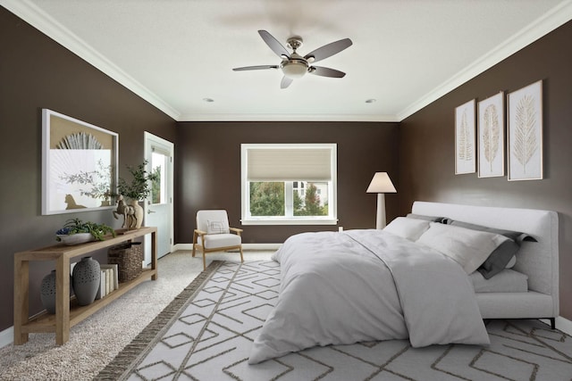 bedroom featuring carpet floors, ceiling fan, and ornamental molding