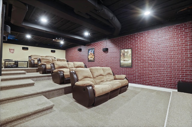 home theater with carpet flooring and brick wall