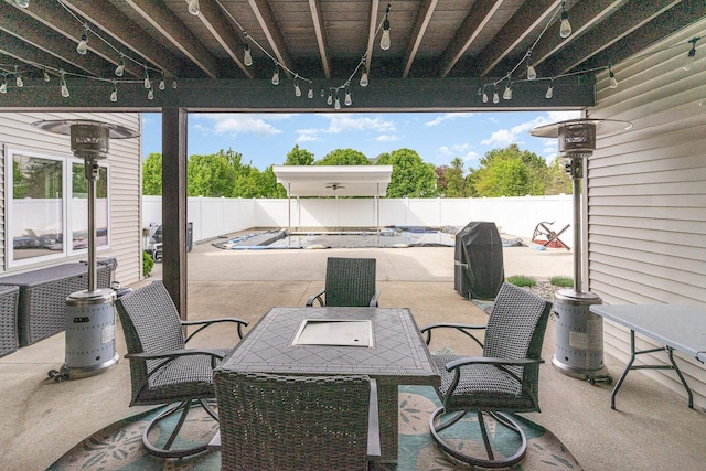 view of patio / terrace with a covered pool