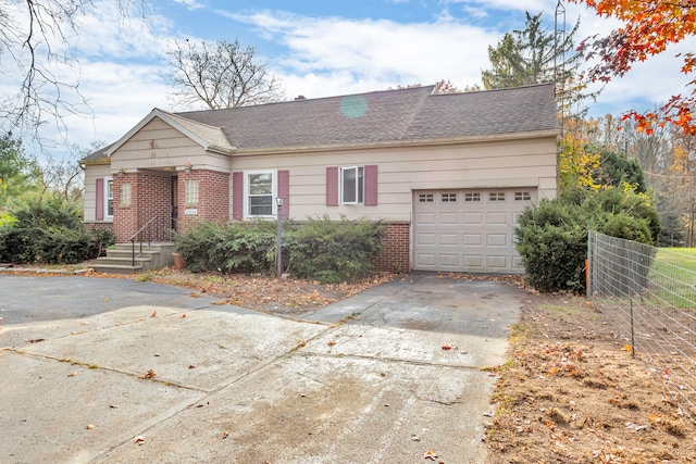 view of front of home with a garage